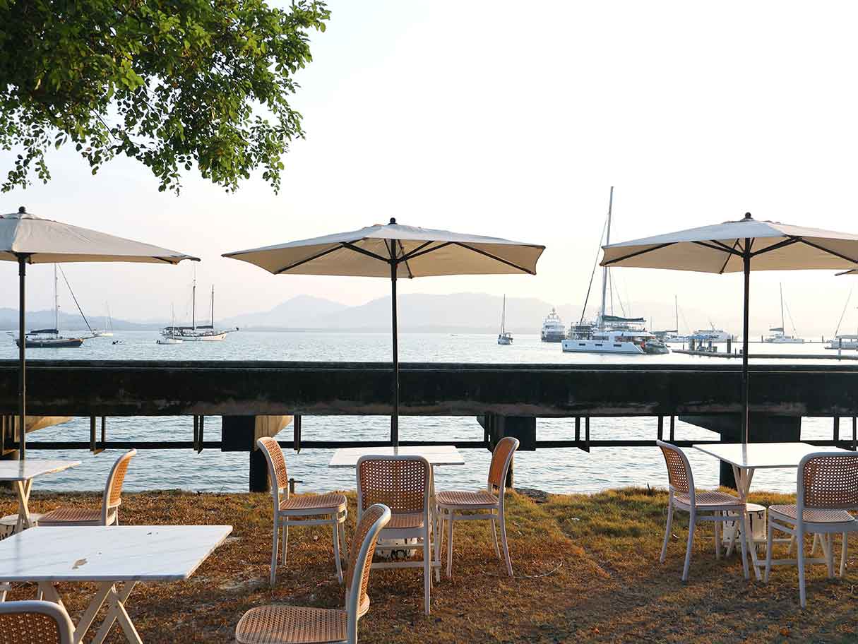Calm marina waters and surrounding greenery