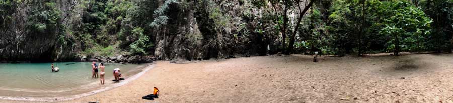 Emerald water and cliffs reminiscent of Koh Muk's scenery